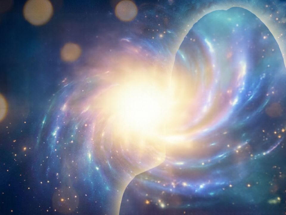 A person stands illuminated by the bright light of their soul, casting a strong glow around them in a dark cosmic environment.